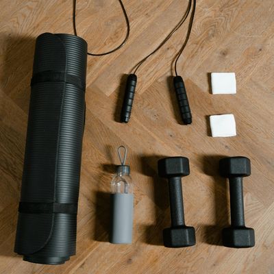 Minimalist home workout equipment on a wooden floor