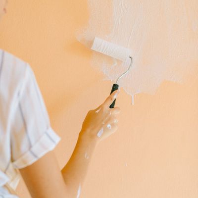 Person doing a balancing movement in a bright room