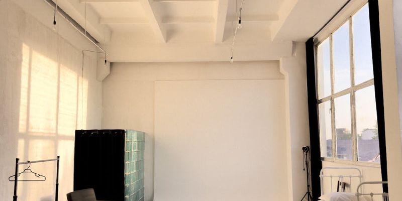 Sunlight streaming into a spacious exercise studio space